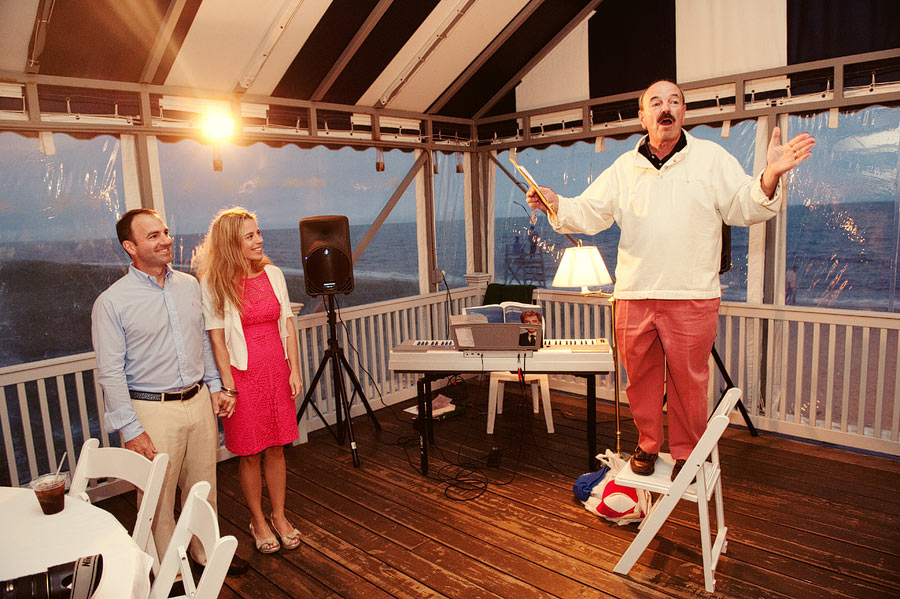 father of the groom gives a toast during the reherasal dinner at the new seabury beach club in cape cod.