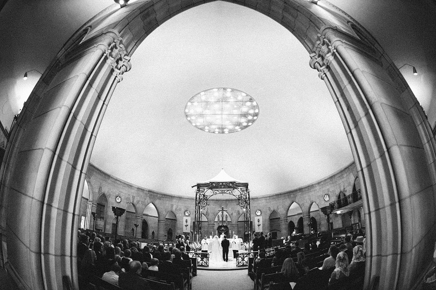 08-st-louis-little-flower-catholic-church-wedding Dome, in the round church in St. Louis. at the Little Flower Catholic Church in St. Louis, Mo.