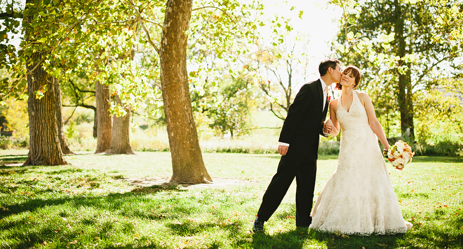 16-forest-park-st-louis-bride-and-groom-wedding Bride and groom kiss at Forest Park in St. Louis