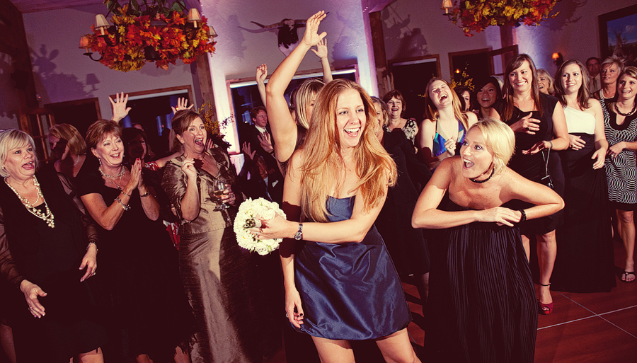 fight for the bouquet at a wedding at Wild Catter Ranch.
