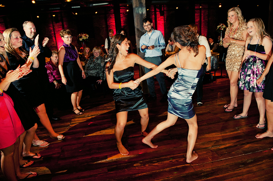 40-fun-dancing-at-wedding-reception guests dance and have fun in this photo.